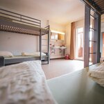 Photo of 4-bed room, shared shower/bath; incl. breakfast